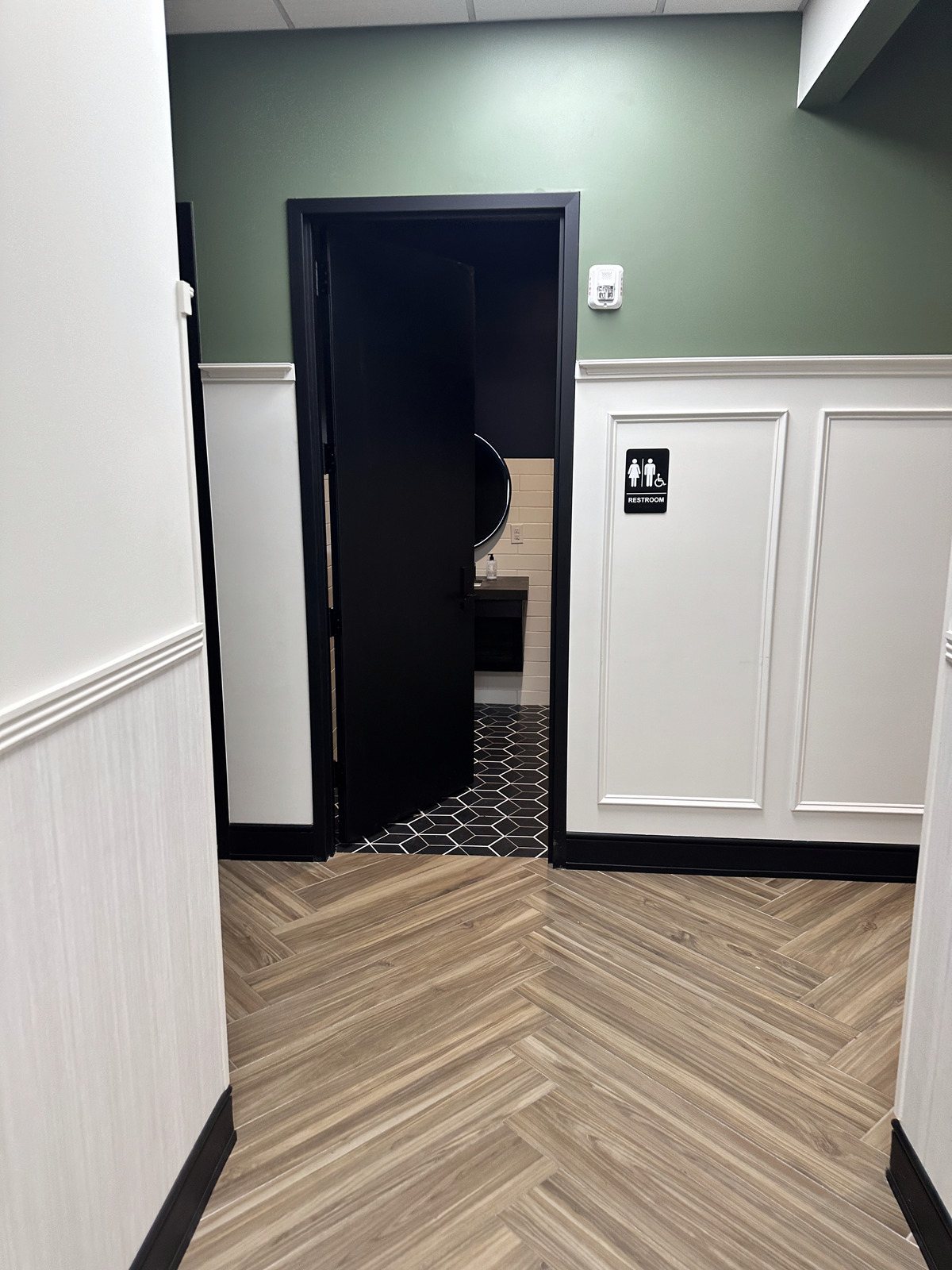 Finished corridor with herringbone wood floor