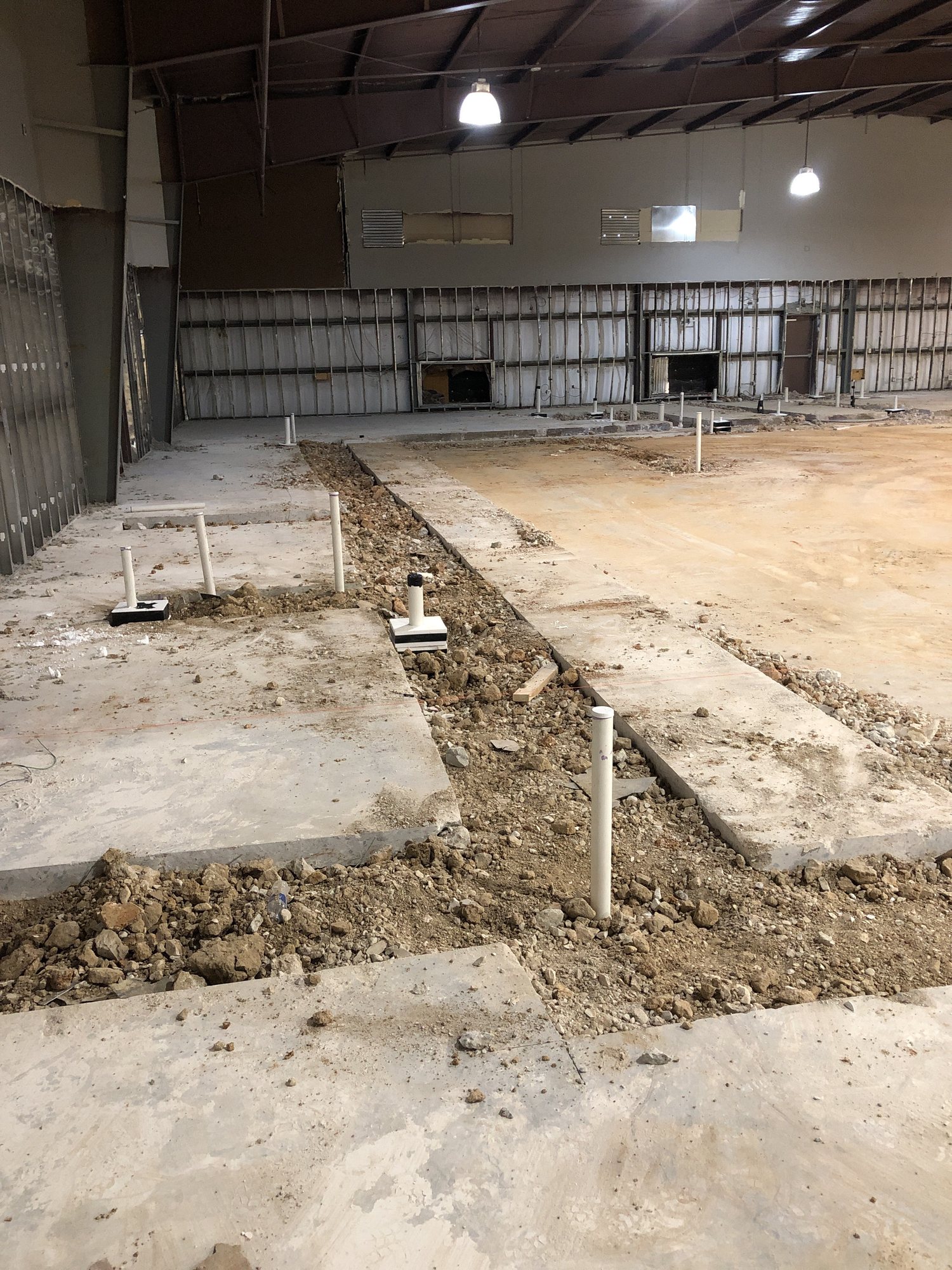 Interior and concrete demolition under way inside the event center