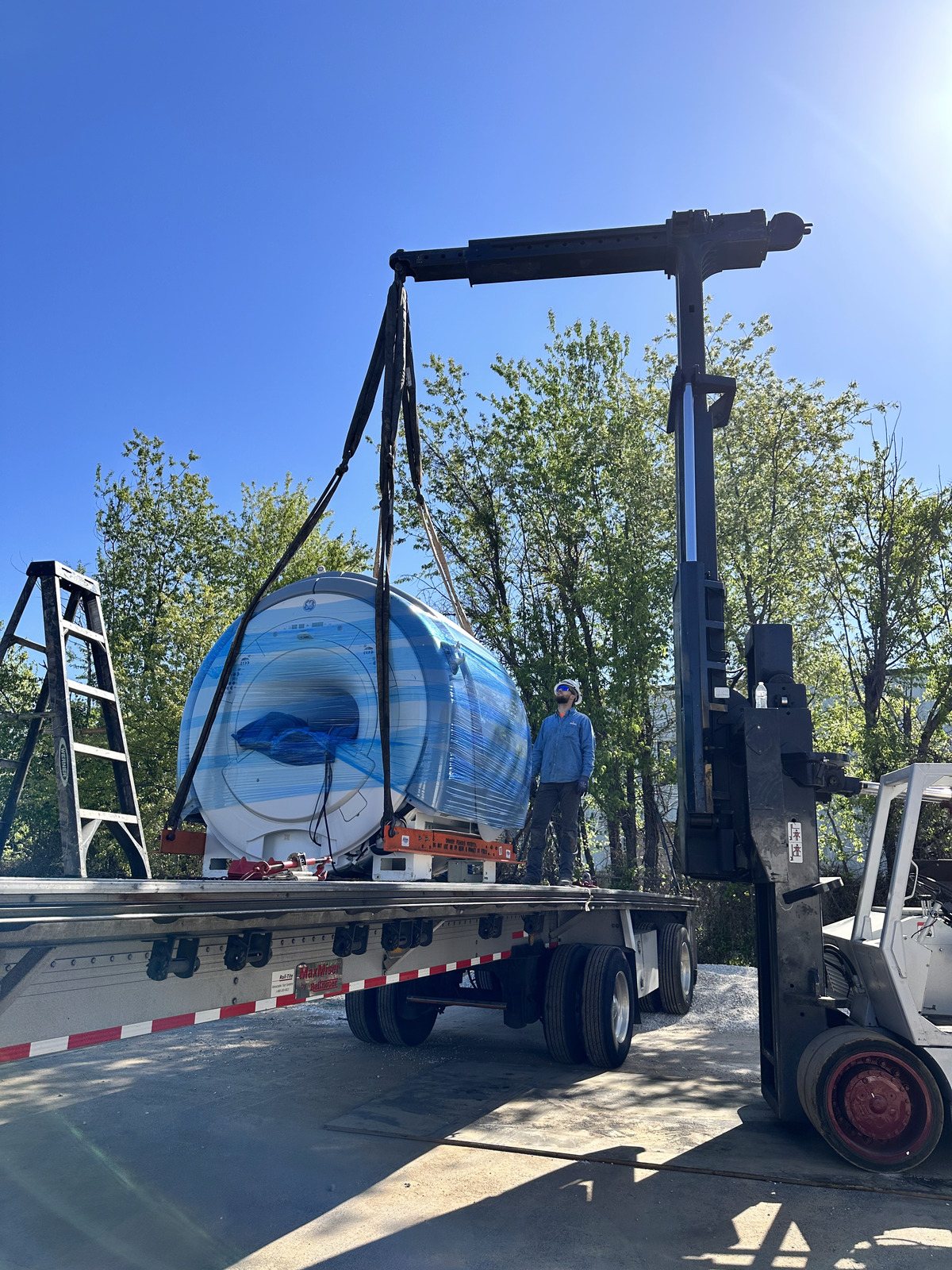 Major medical equipment arriving on site for the crane lift