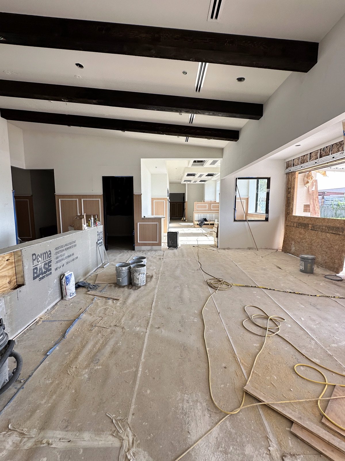 Open finished lobby with exposed beams