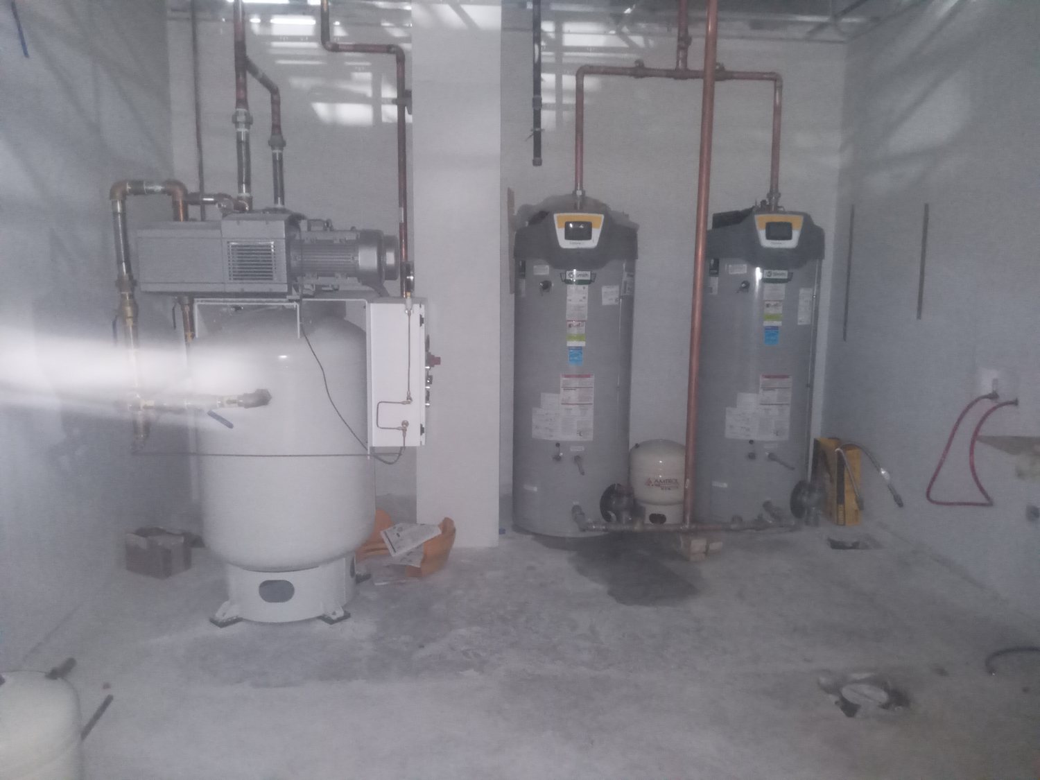 Mechanical room with the chiller and system tanks installed