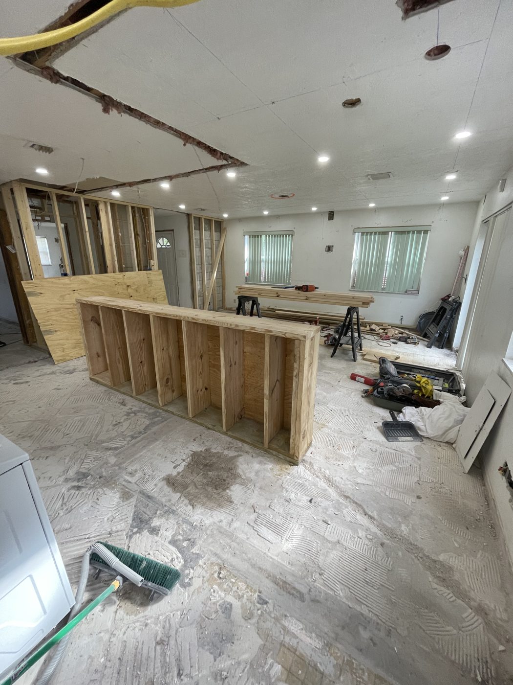 Interior gutted to the studs with the new kitchen island framed