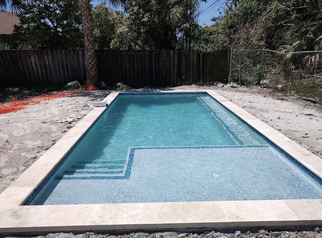 New pool plastered and filled, before the mural and landscaping