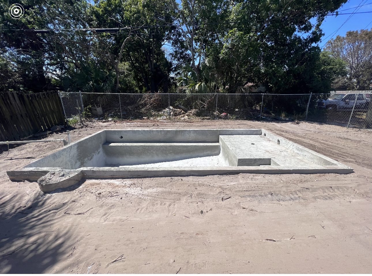 Cured pool shell in the bare backyard