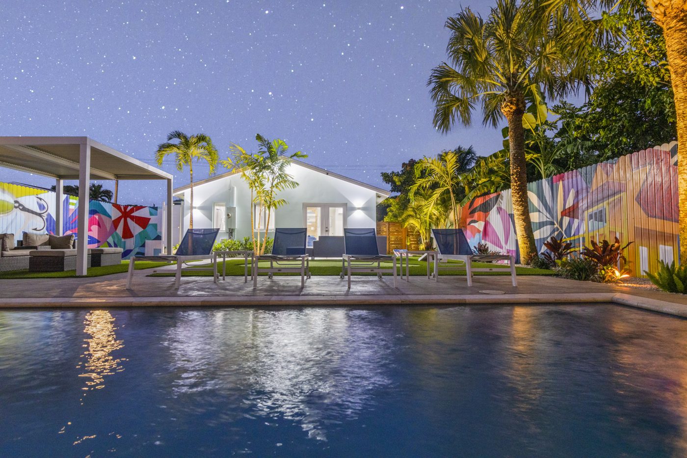 Backyard pool and lounge at a Delray Beach residence