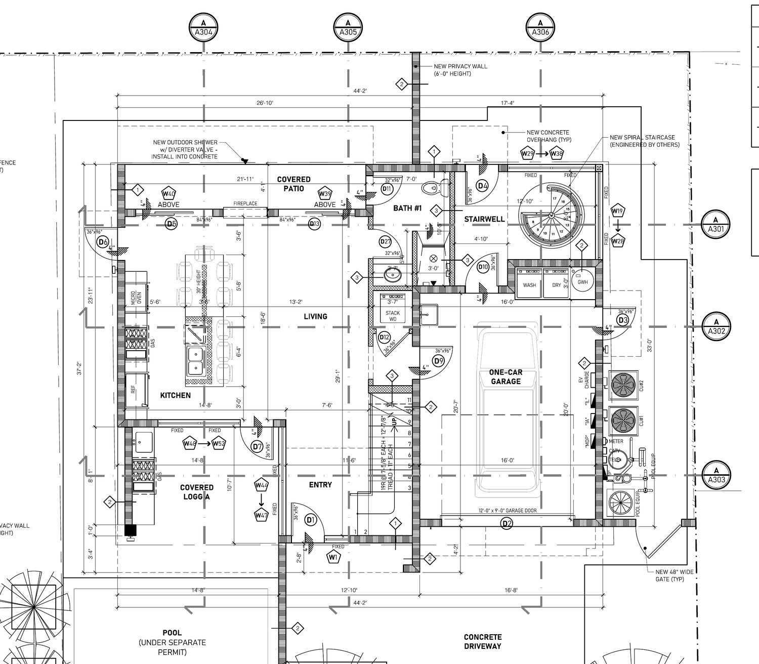 First floor plan of 809 NW 2nd showing the living room, kitchen, garage, loggia and pool