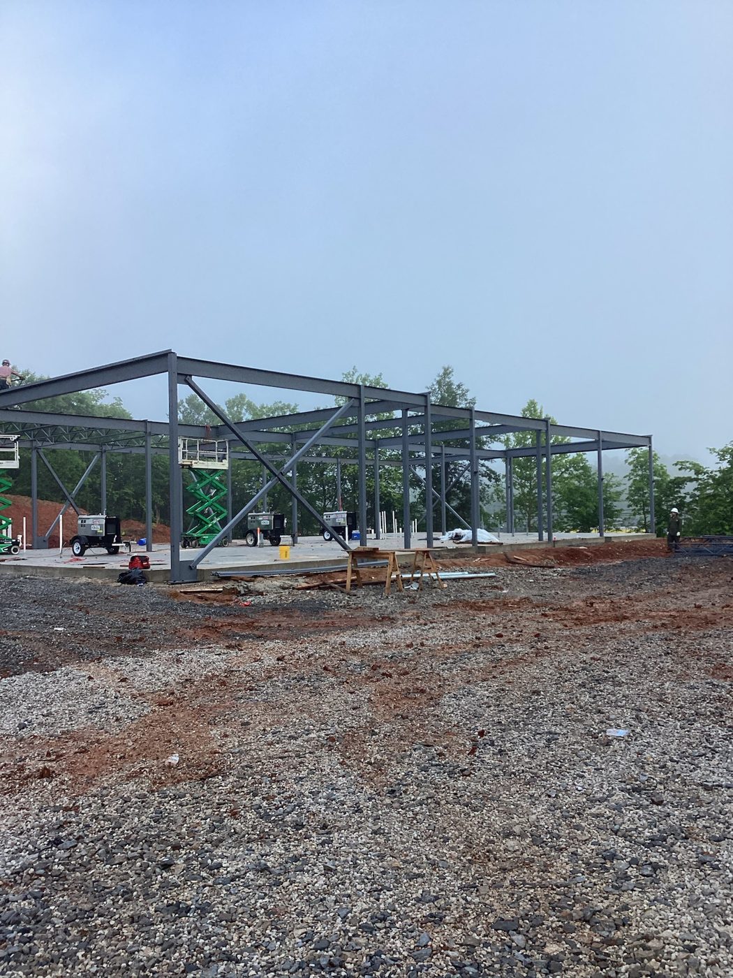 Cured concrete slab with the first steel going up behind it