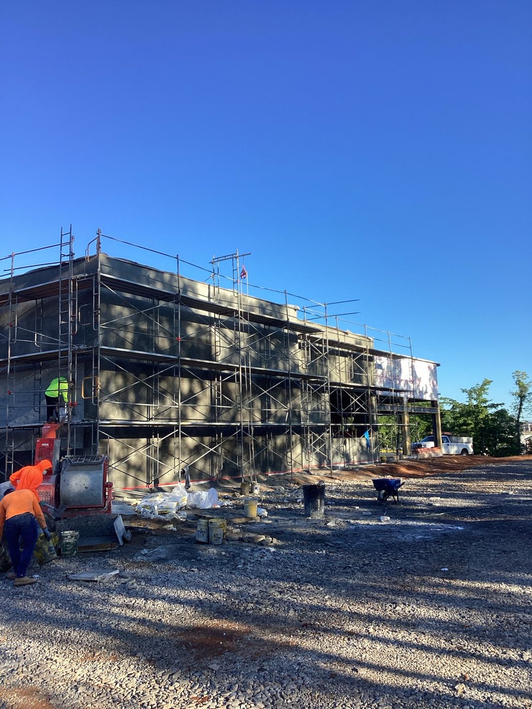Scaffold on the exterior as the finish panels are installed