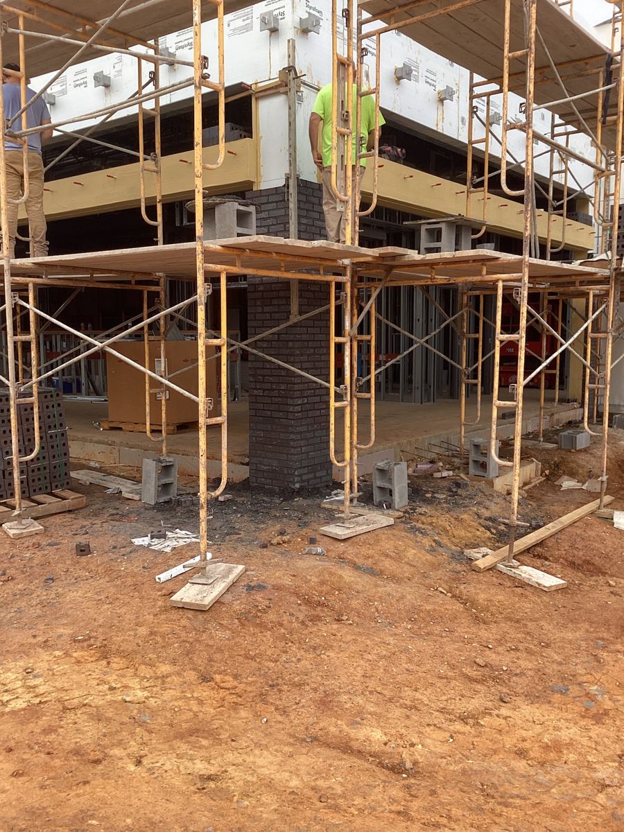 Scaffold inside the building for overhead work