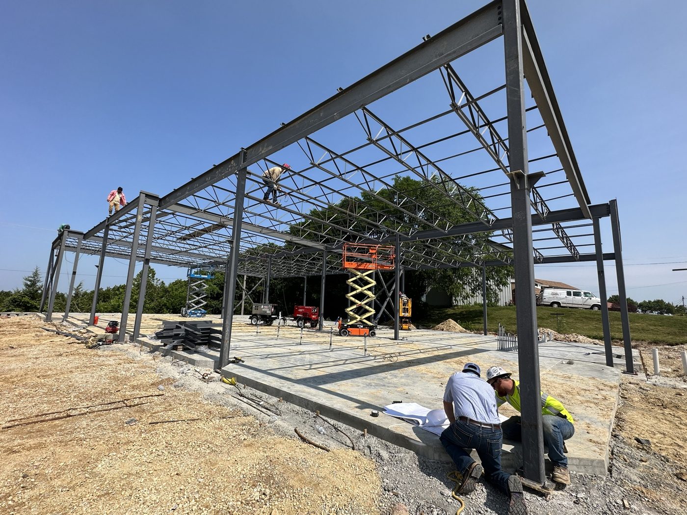Structural steel trusses being set