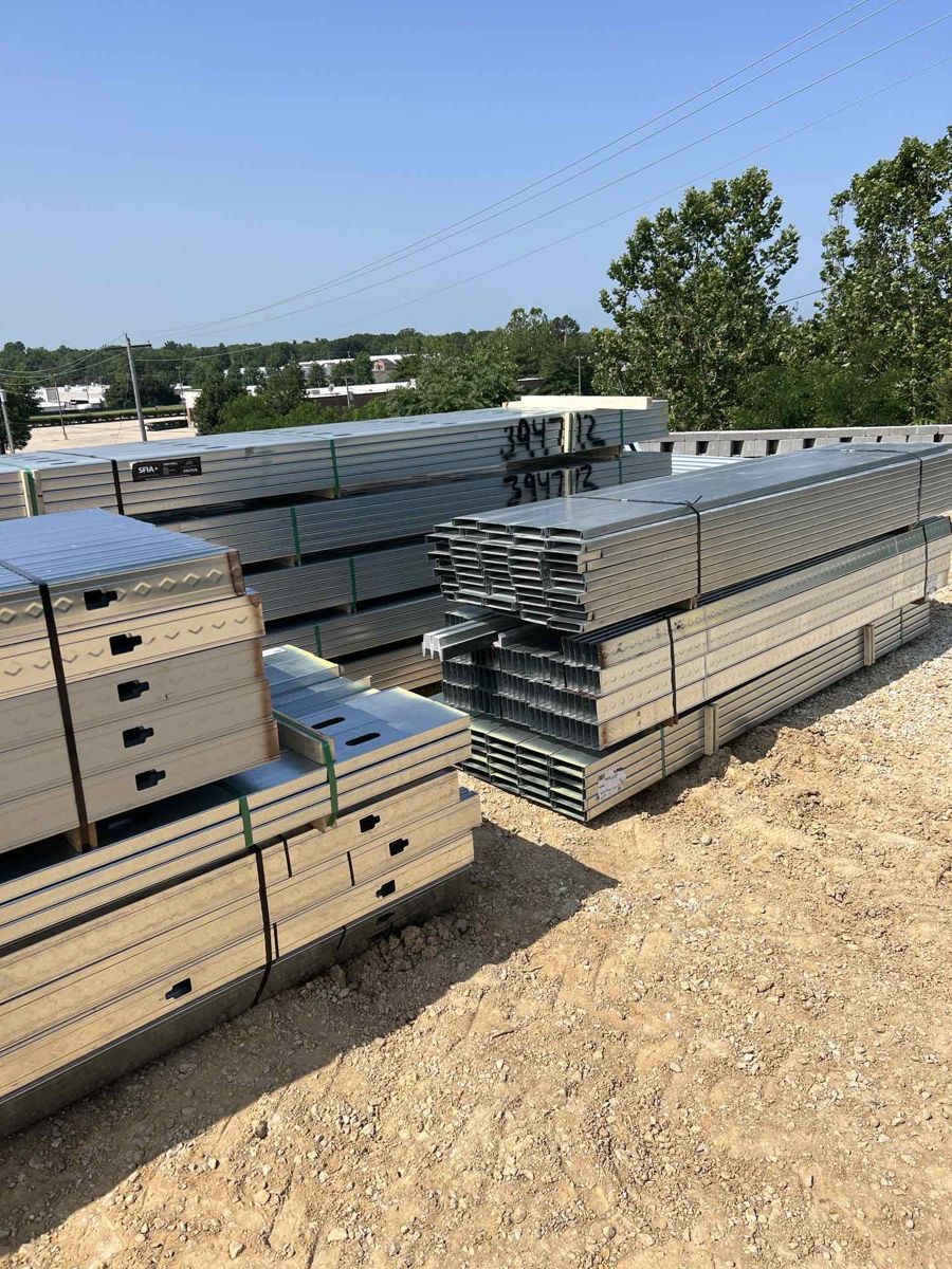 Bundles of cold-formed steel framing delivered to the site