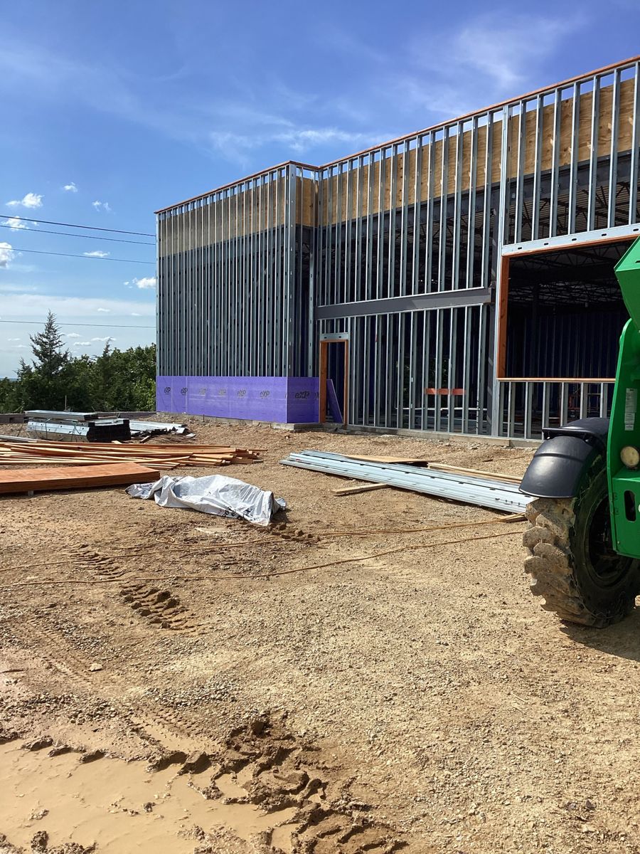 Exterior stud walls framed with sheathing starting at the base